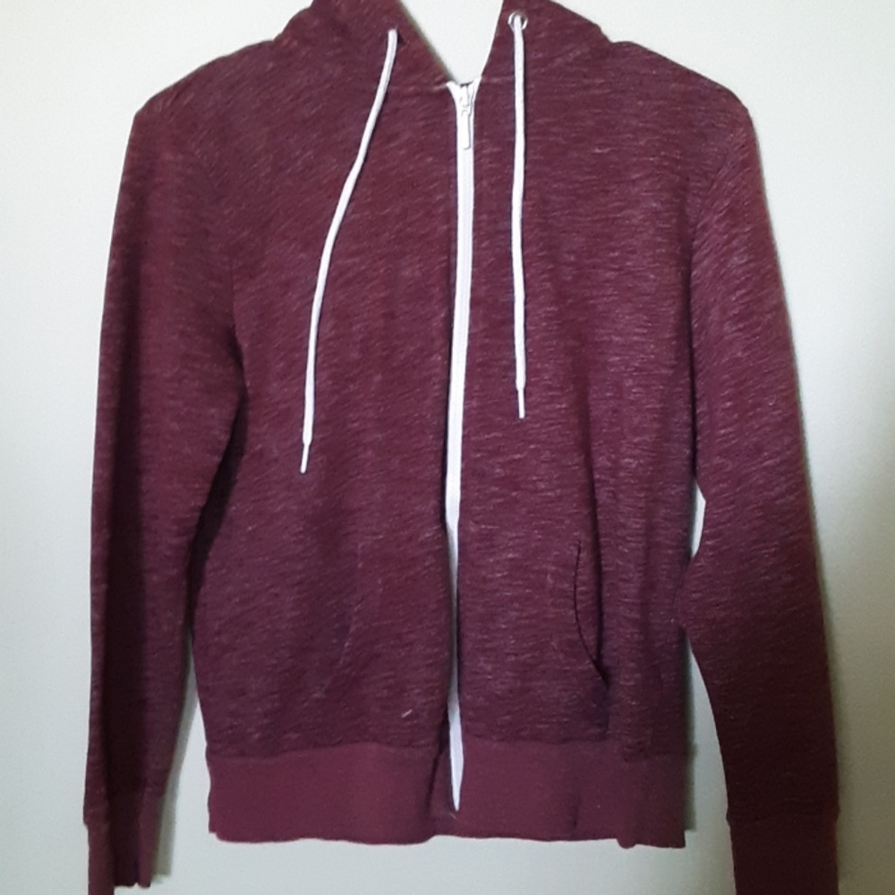 This is a maroon zip up hoodie